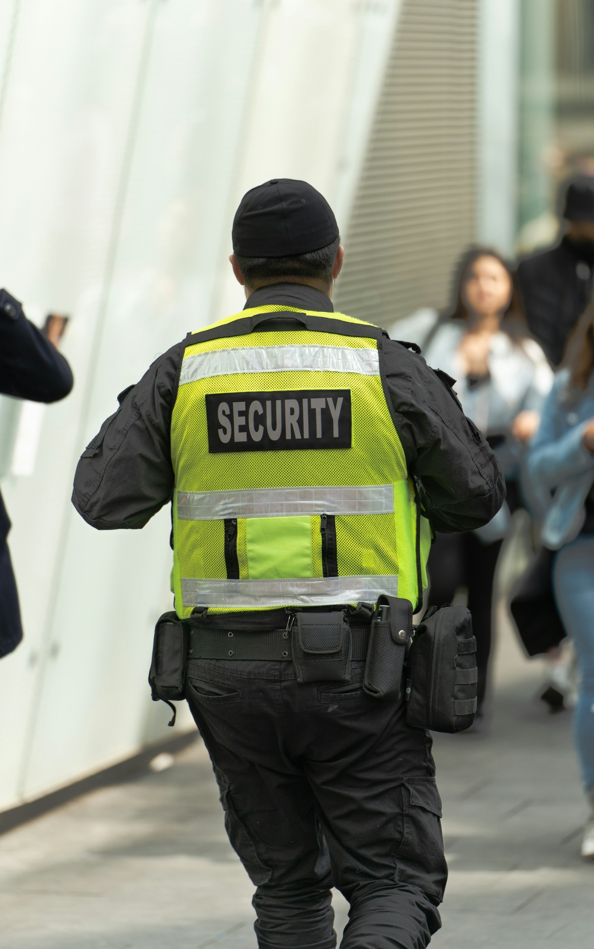 Security guard on patrol outside a modern building